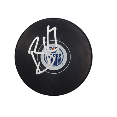 Brett Kulak Autographed Edmonton Oilers Logo Hockey Puck Beckett