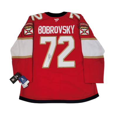 Close up of Sergei Bobrovsky autograph on Florida Panthers red premium jersey
