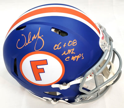 Urban Meyer Autographed Florida Gators Alternate Blue Riddell Authentic Helmet W/ 06 & 08 National Champs Beckett Witnessed